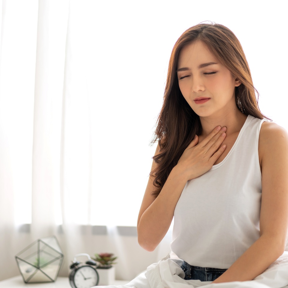 Sick asian women touching neck unwell coughing with sore throat pain,lung cancer,bronchitis,Bronchial Asthma,Tuberculosis,pneumonia,covid-19,eco air pollution pm2.5.insurance and hospital